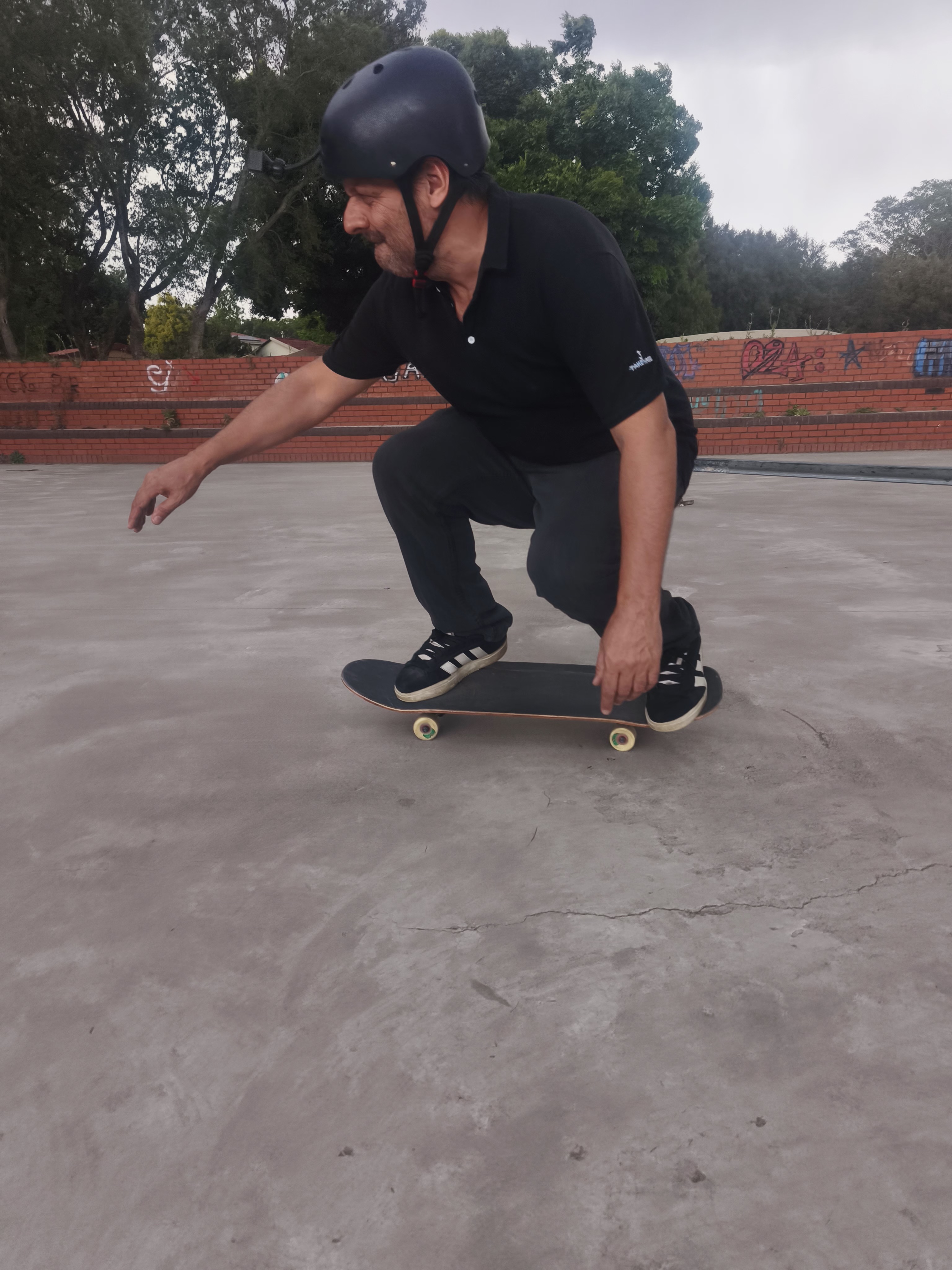Skating in deep balanced crouch at 54